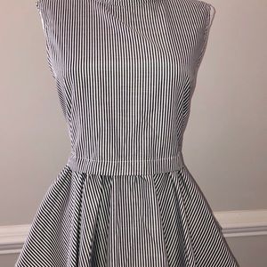 High cut classic striped peplum sleeveless top